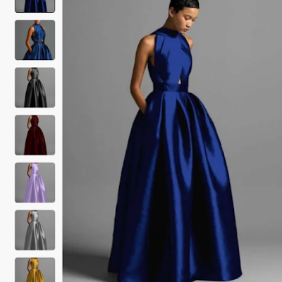 Mulher a usar um prom dress azul royal de corte clássico, com saia volumosa e design elegante, ideal para baile de finalistas